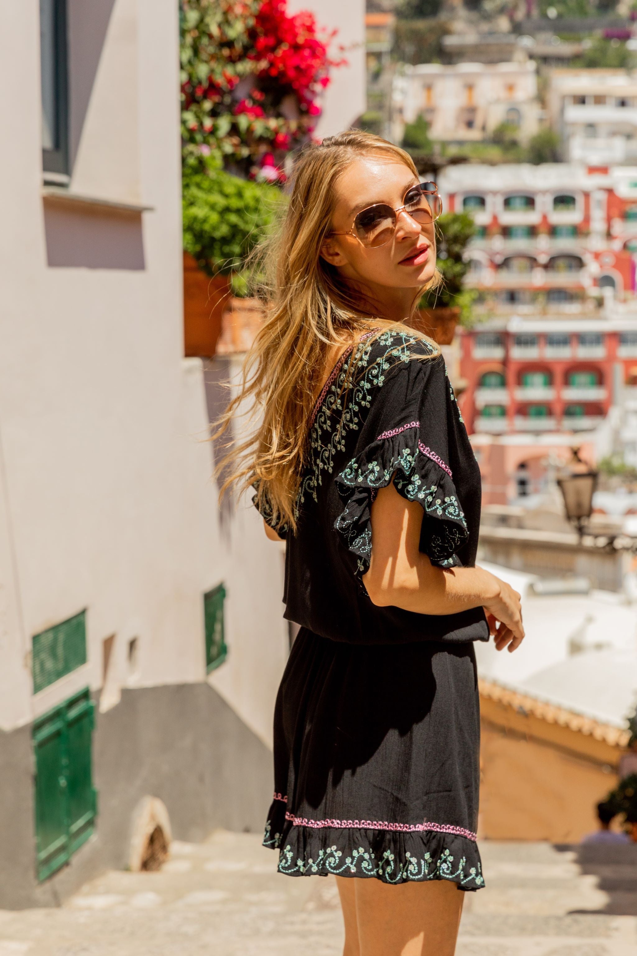 Black cotton blouson beach dress with aqua pink gold by Lindsey Brown resort wear