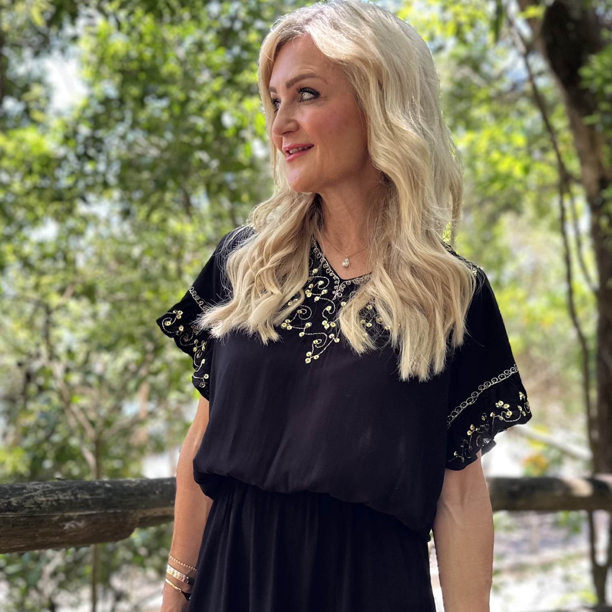 Black gold drop waisted beach dress to wear on a Cruise by Lindsey Brown resort wear 