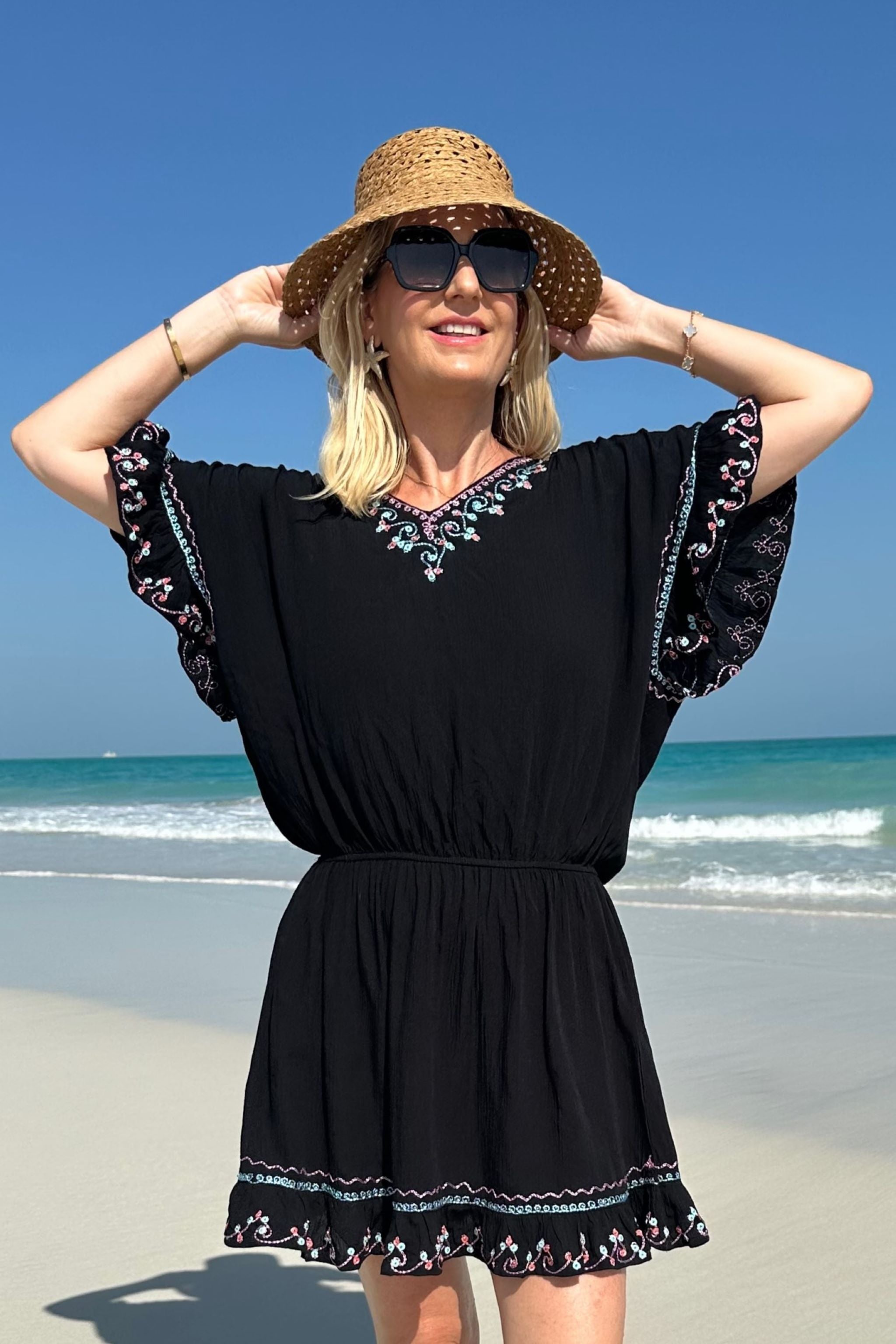 black cotton beach dresses to wear on holiday by Lindsey Brown