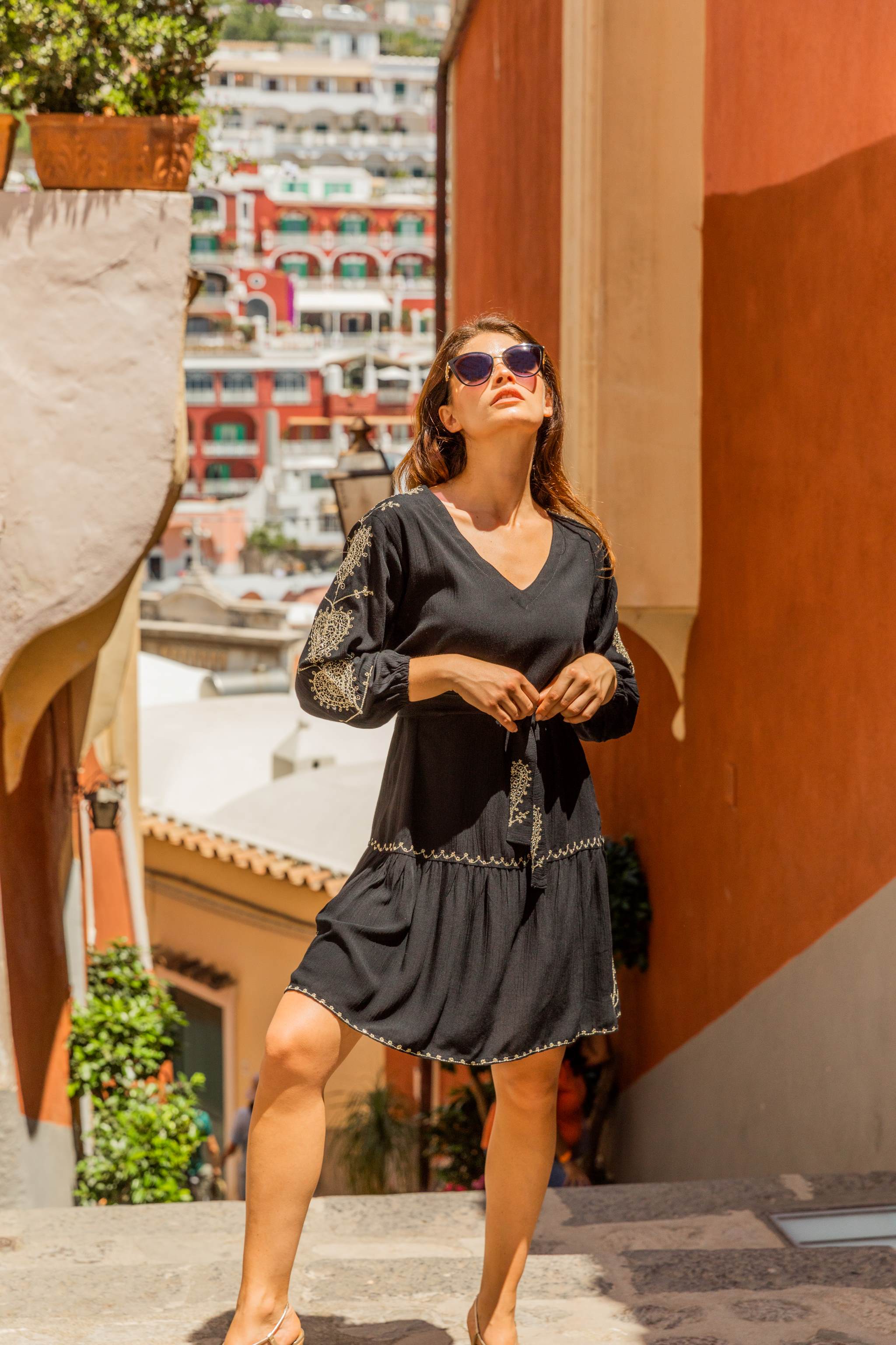 Black long sleeve beach dress to wear on holiday by Lindsey Brown resort wear