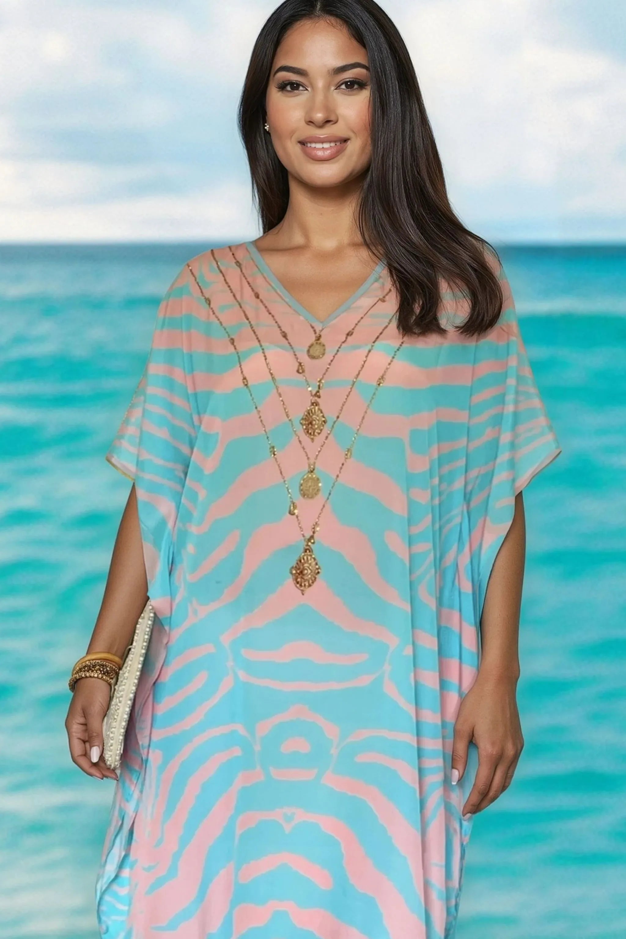 blue and pink silk  printed beach cover ups to wear on a cruise holiday by Lindsey Brown