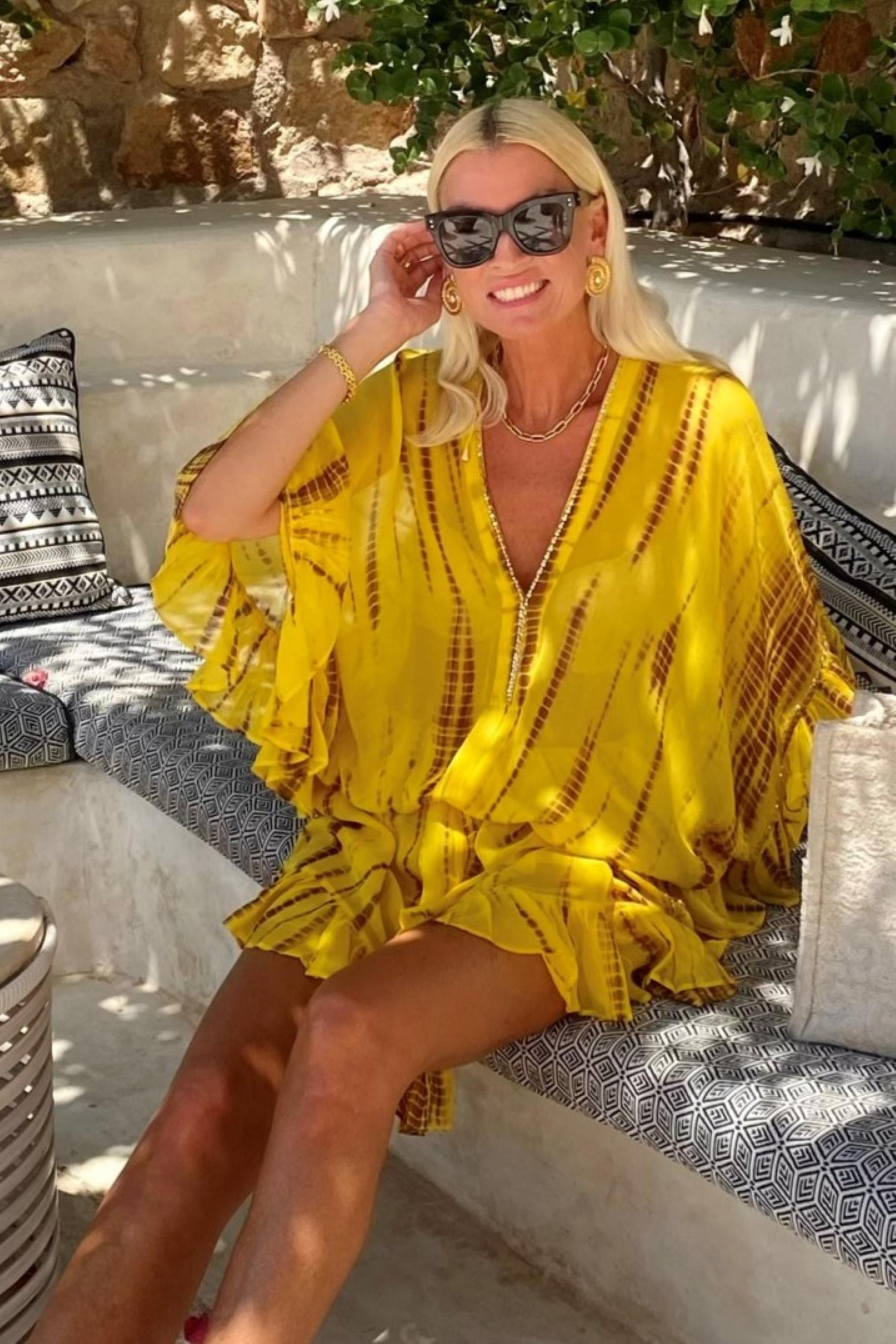 Luxury silk resort wear Anna Mavridis wears Lindsey Brown yellow silk resort wear