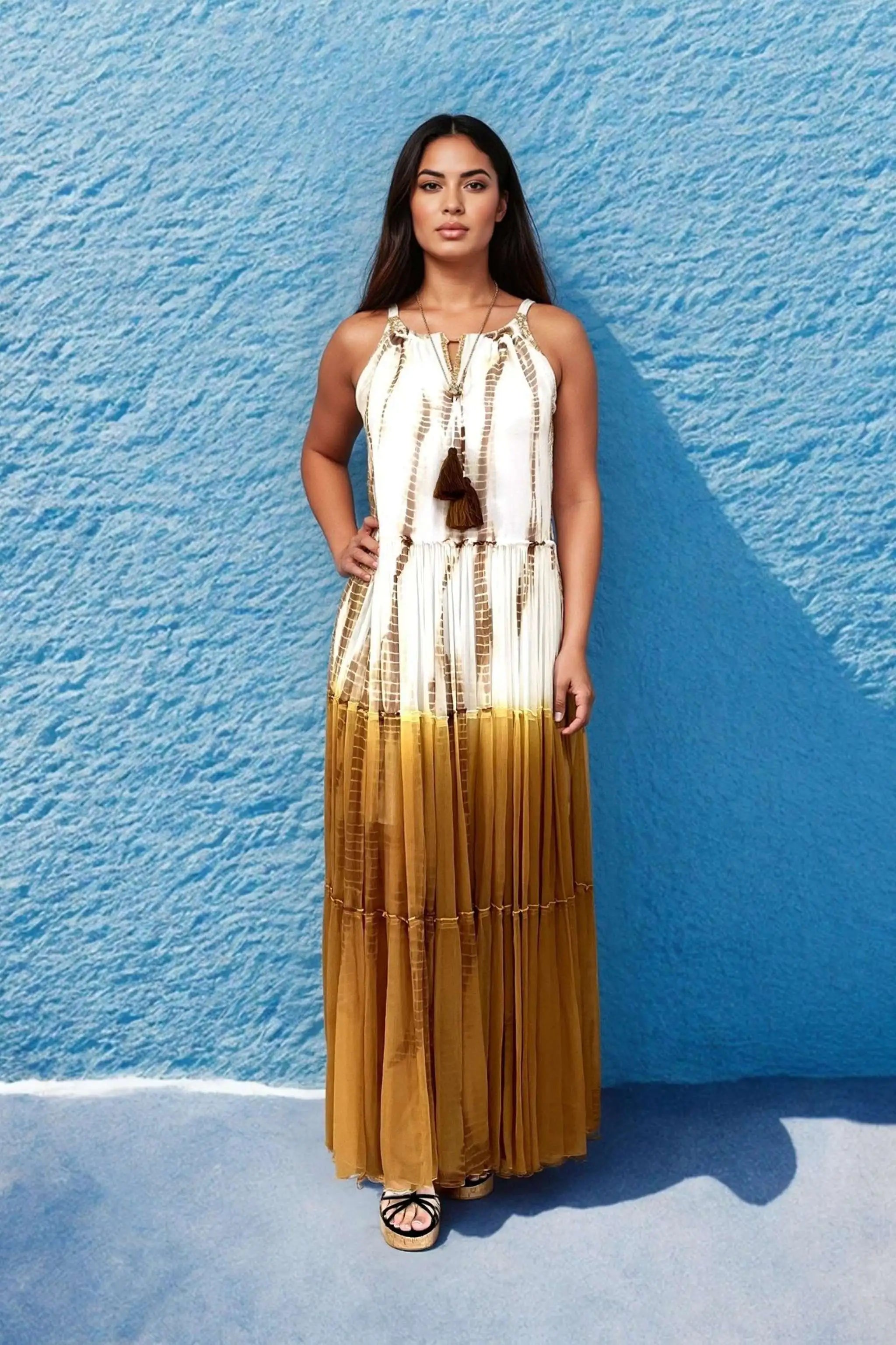 white, tan and brown silk sleeveless maxi dress to wear on luxury vacations by Lindsey Brown