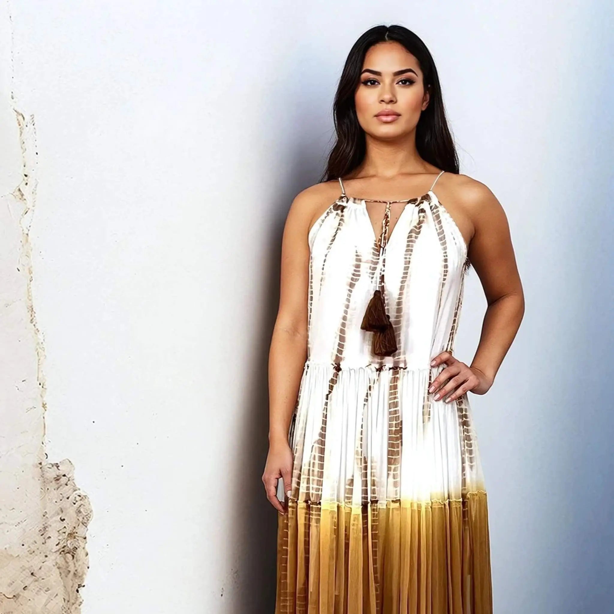 white brown tie dye silk luxury maxi dresses to wear on holiday by Lindsey Brown resort wear 