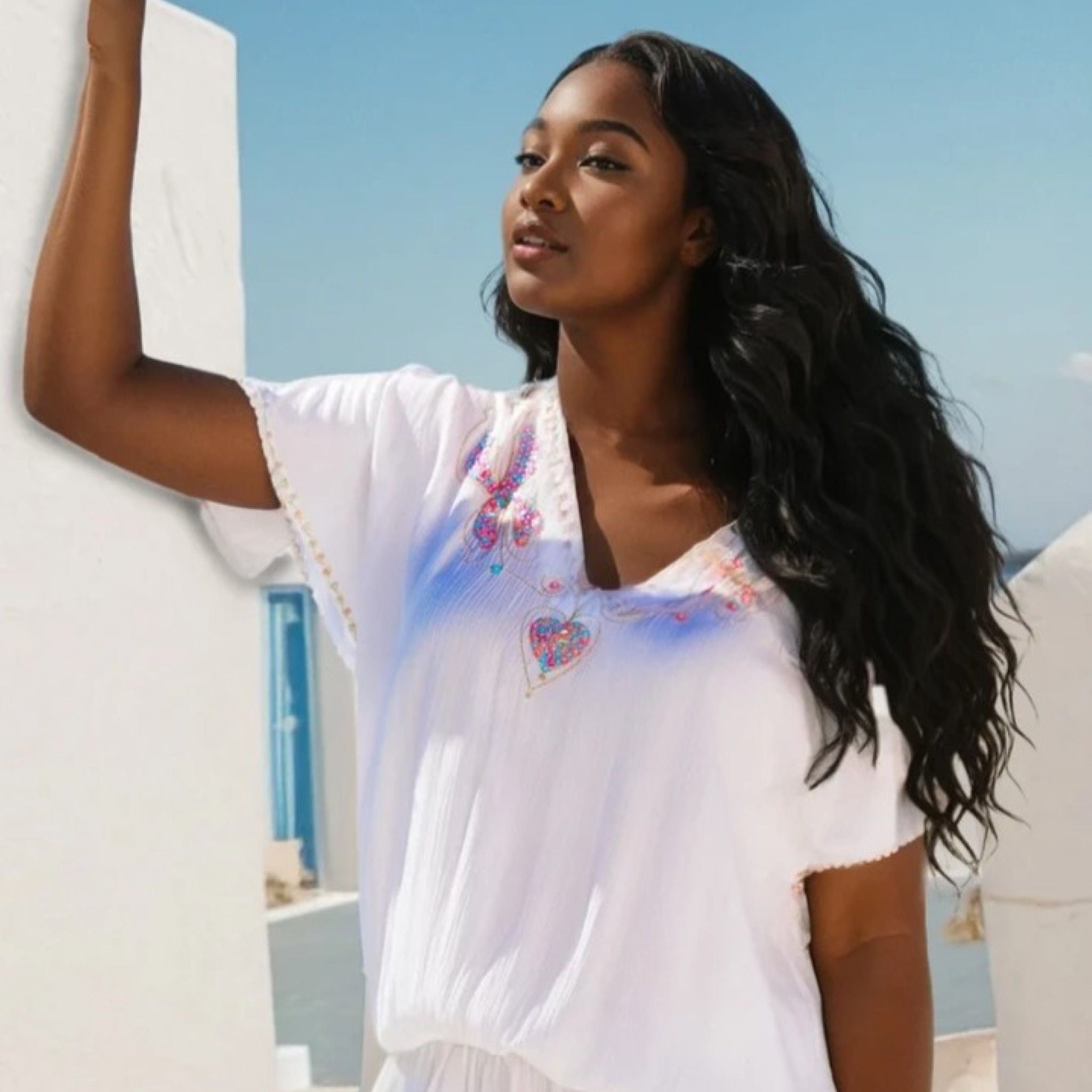 white plus size cotton short beach dress to wear on holiday by Lindsey Brown luxury resort wear