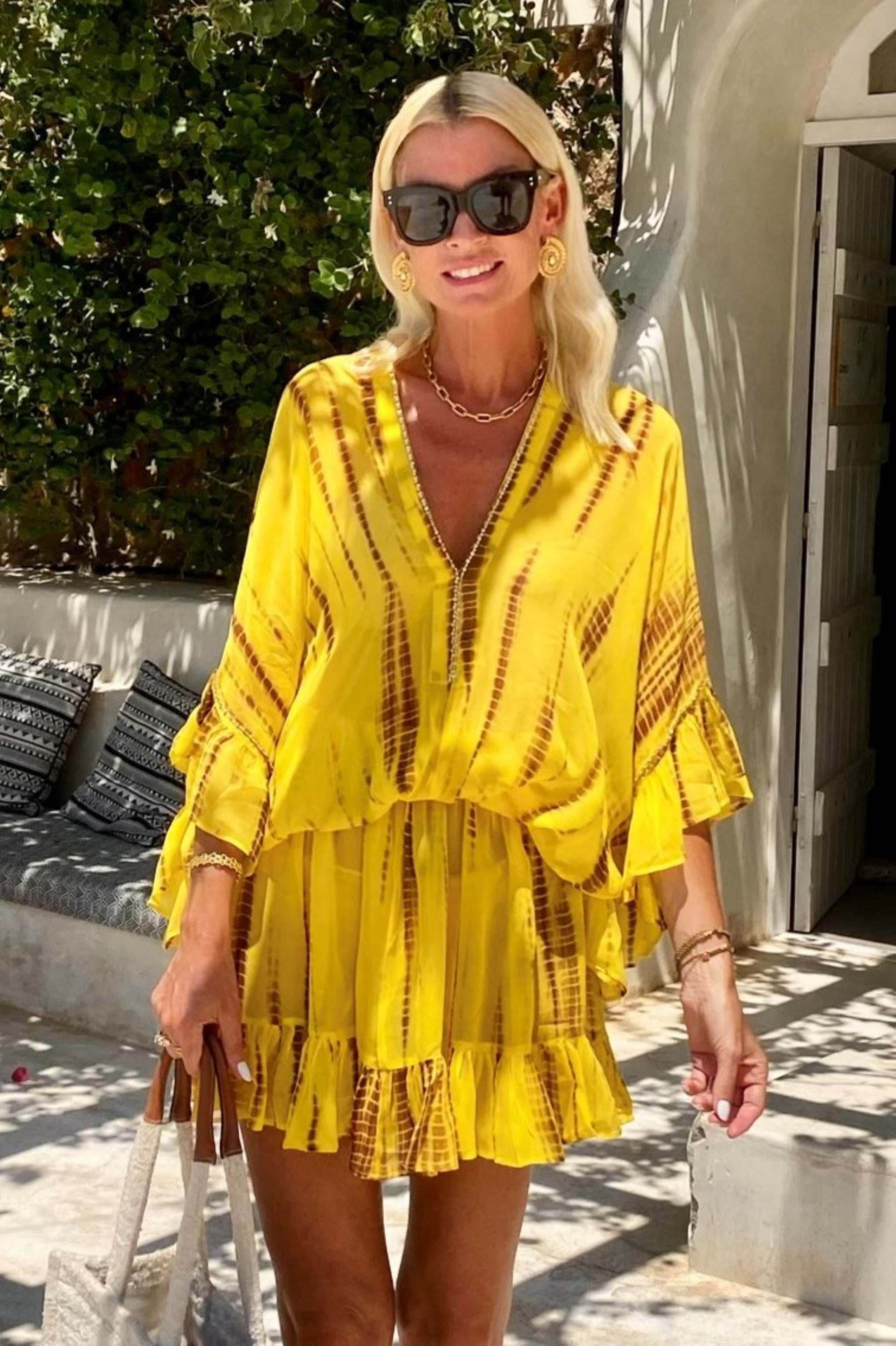 Yellow bloused silk kaftan dress to wear on holiday by Lindsey Brown resort wear 