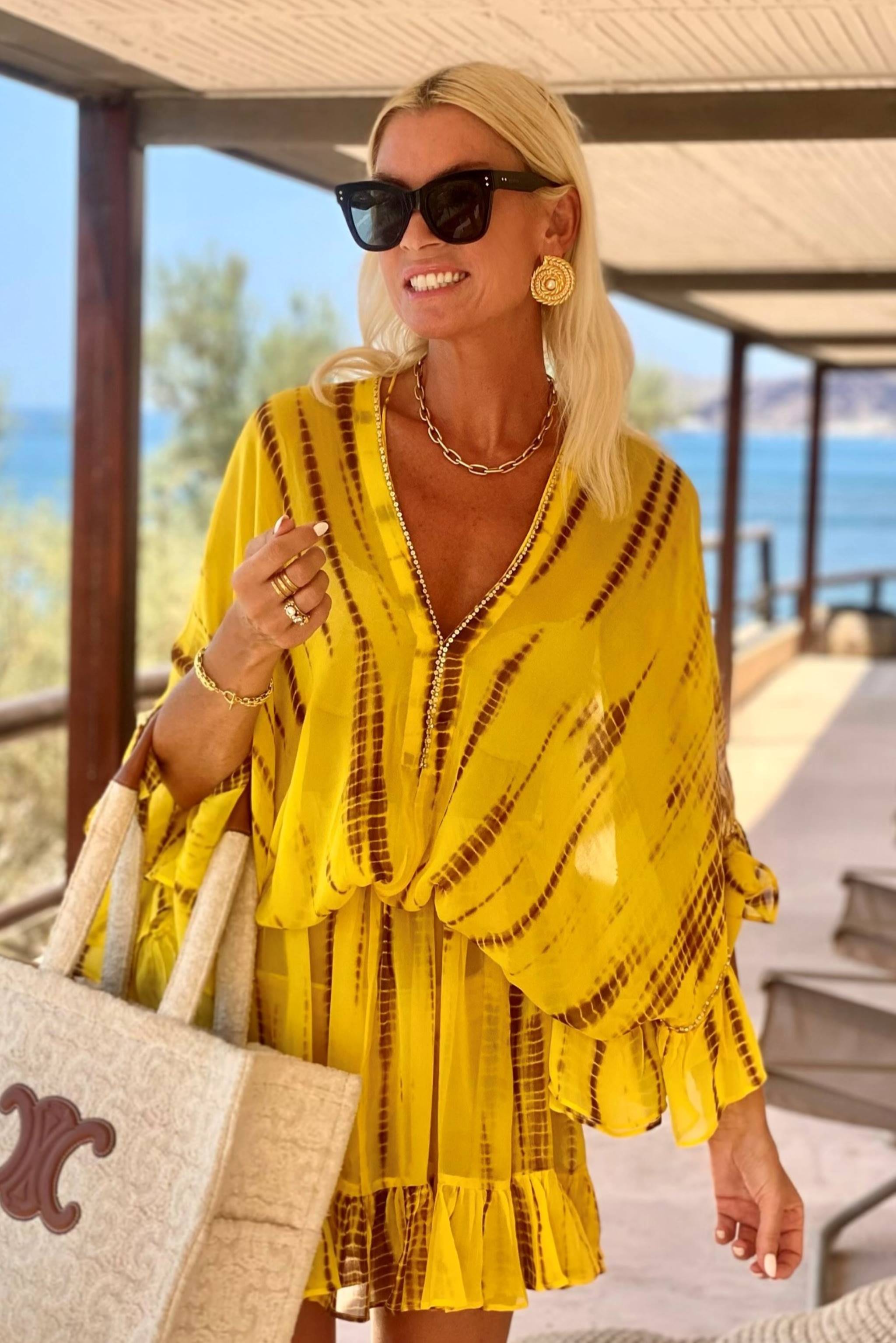 Yellow silk kaftans worn by Anna Mavridis wears Lindsey Brown luxury silk resort wear